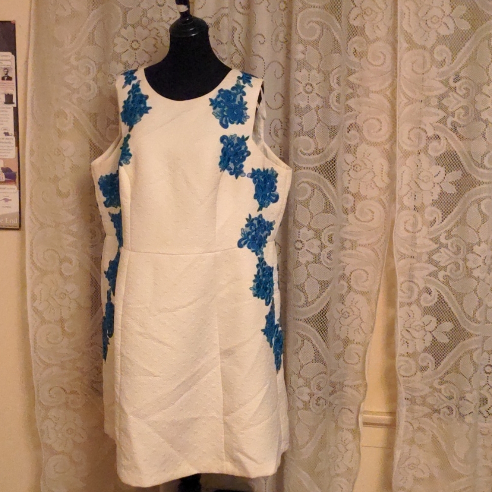 White dress with blue flowers